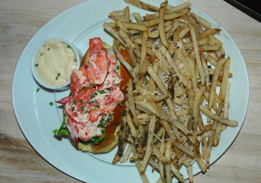 Alto Mare's lobster roll is upscale, fresh, and served with loads of thin-cut fries.