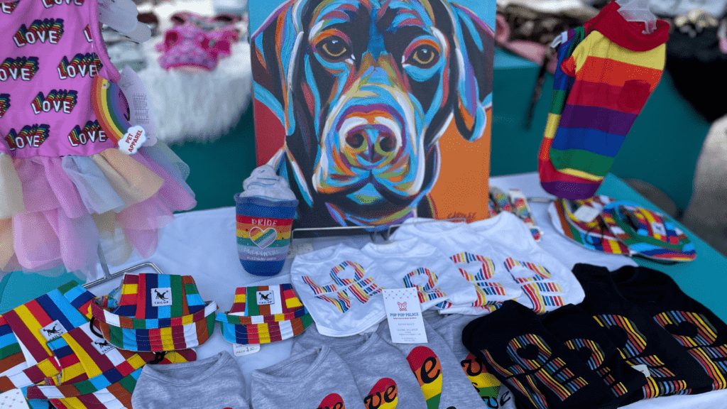 A vendor booth with a dog painting