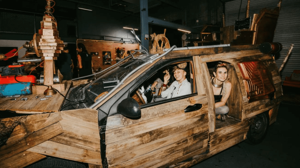 People inside a wooden car