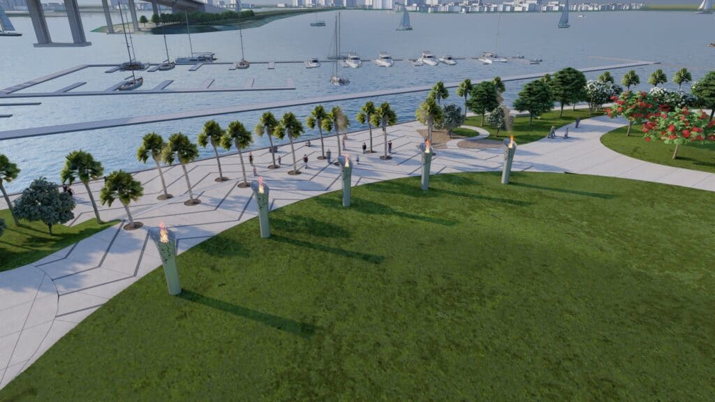 Rendering of a waterfront performing arts venue. torches are lit at the edge of the lawn area. 